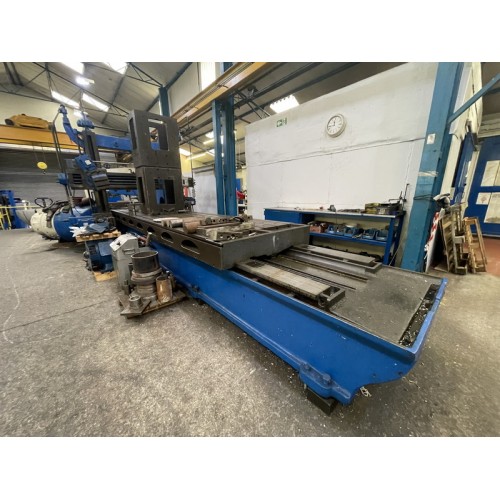 Stirk Double column planer, table 220 inch x 48 inch, base overall approx 11m.

[Ref: 107758]

