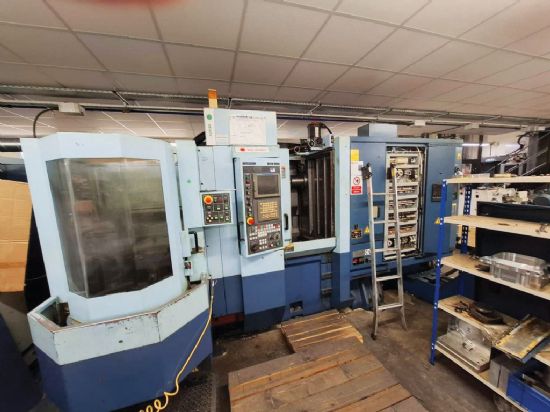 4 Plus one pallet loader 
300mm x 300mm pallets, 
full B-axis, 
swarf conveyor, 
through nose co