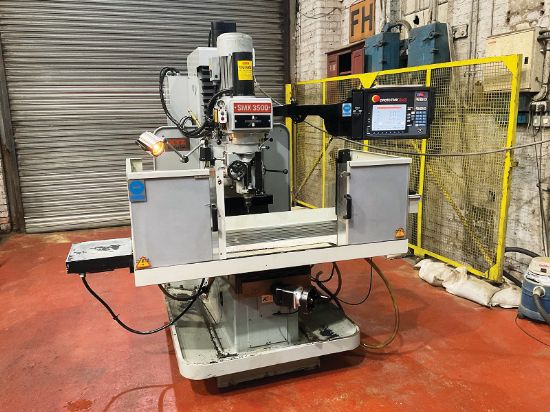 New 2014. 
Table 1,372 x 356mm, 
X-axis 770mm, 
X- & Y-axis 500mm, 
spindle 40 Int, 
40-5,000rp